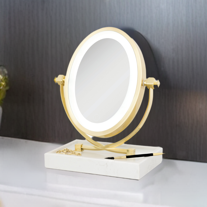 Zadro LOVGLAM55 705004424363 product photo front right angle view with items in tray, brooklyn led lighted makeup mirror with magnification & marble tray in front of a dark textured wall and top of a on white bathroom countertop