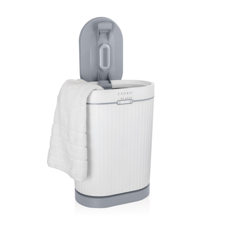Zadro fluted white and gray oval 20 liter towel warmer with lid open and towel hanging out of side