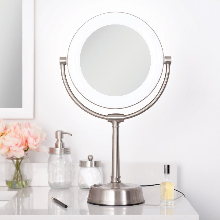 Zadro SLVRLT410 705004420686 environment photo front view on white counter, lexington lighted makeup mirror with magnification in front of a real life setting